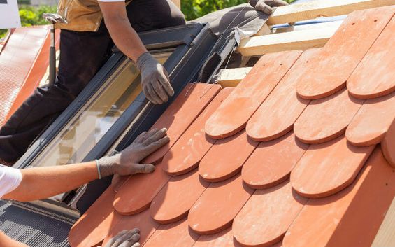 Roof tiles being repaired