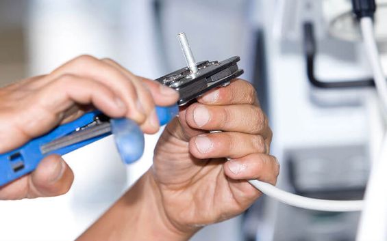 A wire being trimmed